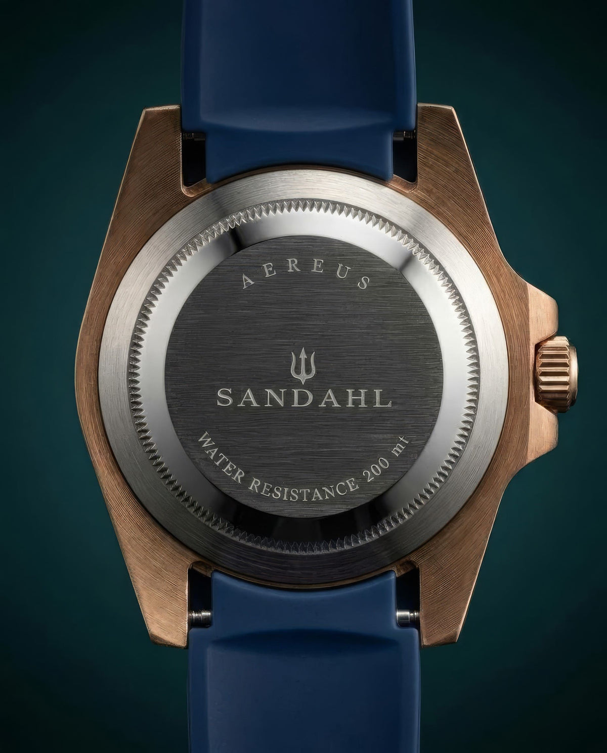 Rear view of SANDAHL AEREUS Abyss Blue, showing its engraved steel caseback, bronze case and navy blue rubber strap.