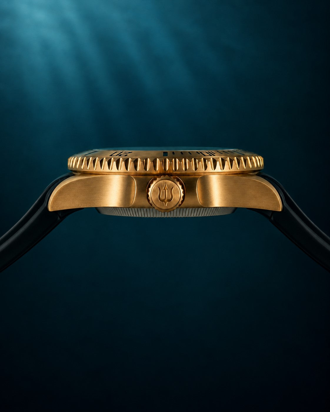 Side profile of SANDAHL AEREUS Patina Teal, showing the bronze case, engraved dive bezel and trident crown.