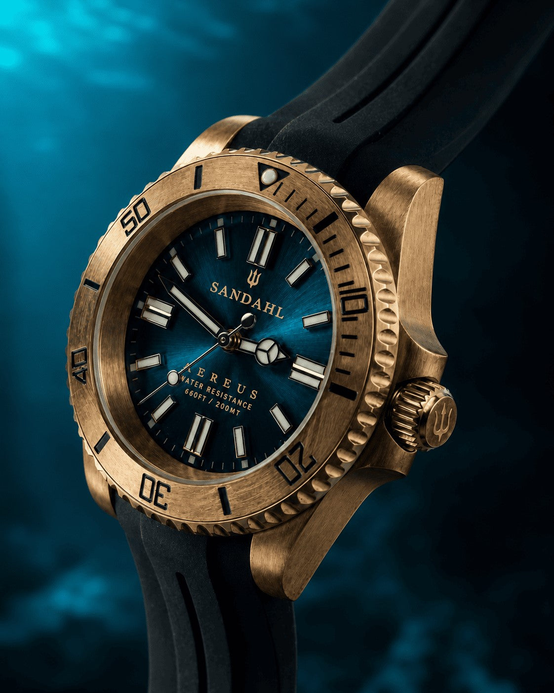 SANDAHL AEREUS Patina Teal with a blue-green dial, bronze case and black rubber strap, viewed at an angle.