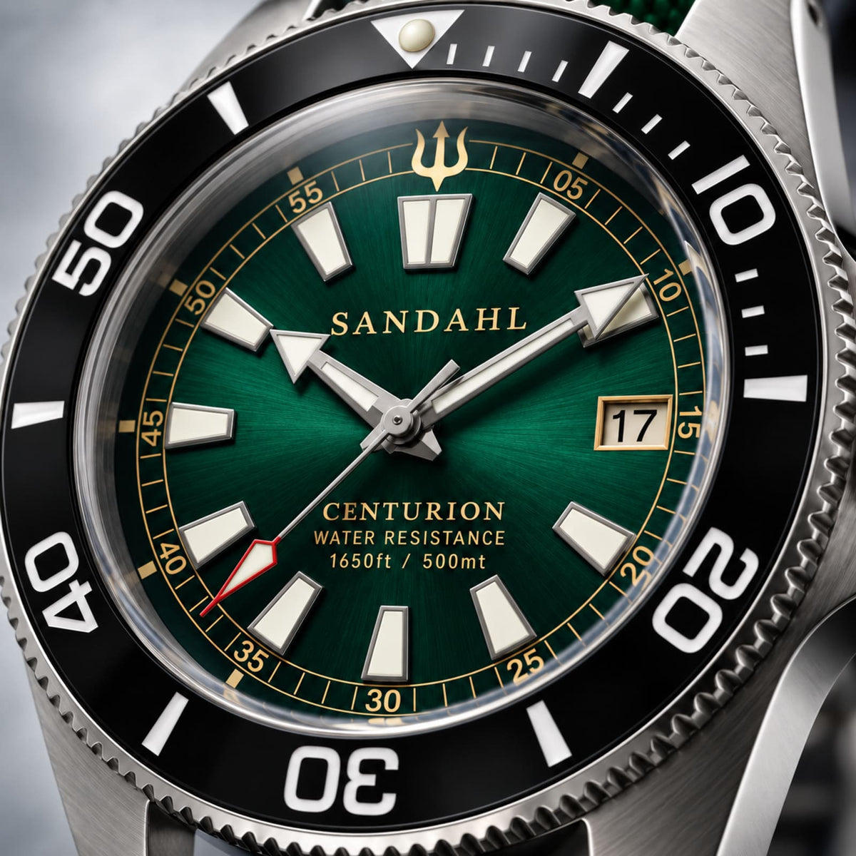 Close-up of the SANDAHL CENTURION Trench Green sunburst dial, with gold lettering, luminous hour markers and a red-accented seconds hand.
