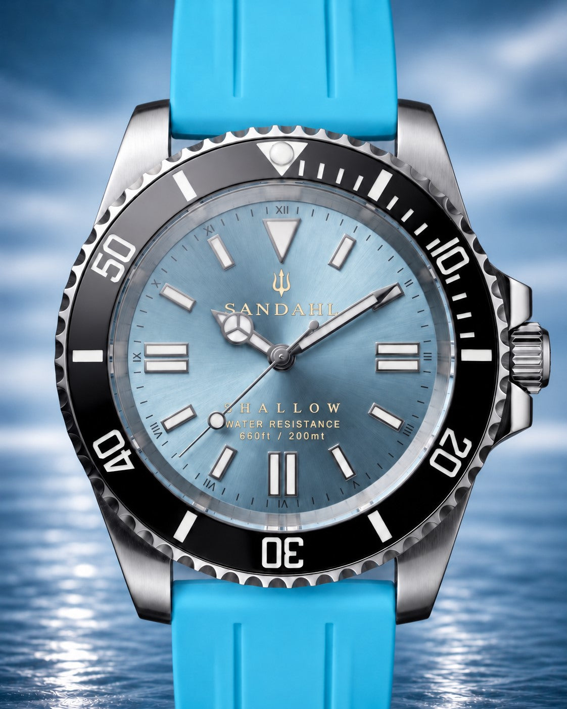 SANDAHL SHALLOW Glacial Blue with an ice-blue dial, black dive bezel and bright blue rubber strap, viewed from the front.
