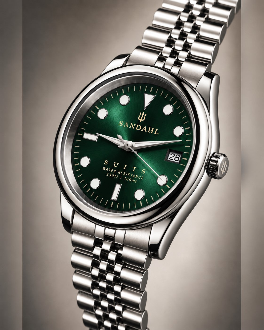 SANDAHL SUITS with regent green sunburst dial, polished watch case and Jubilee bracelet, photographed in a 45 degree angle.