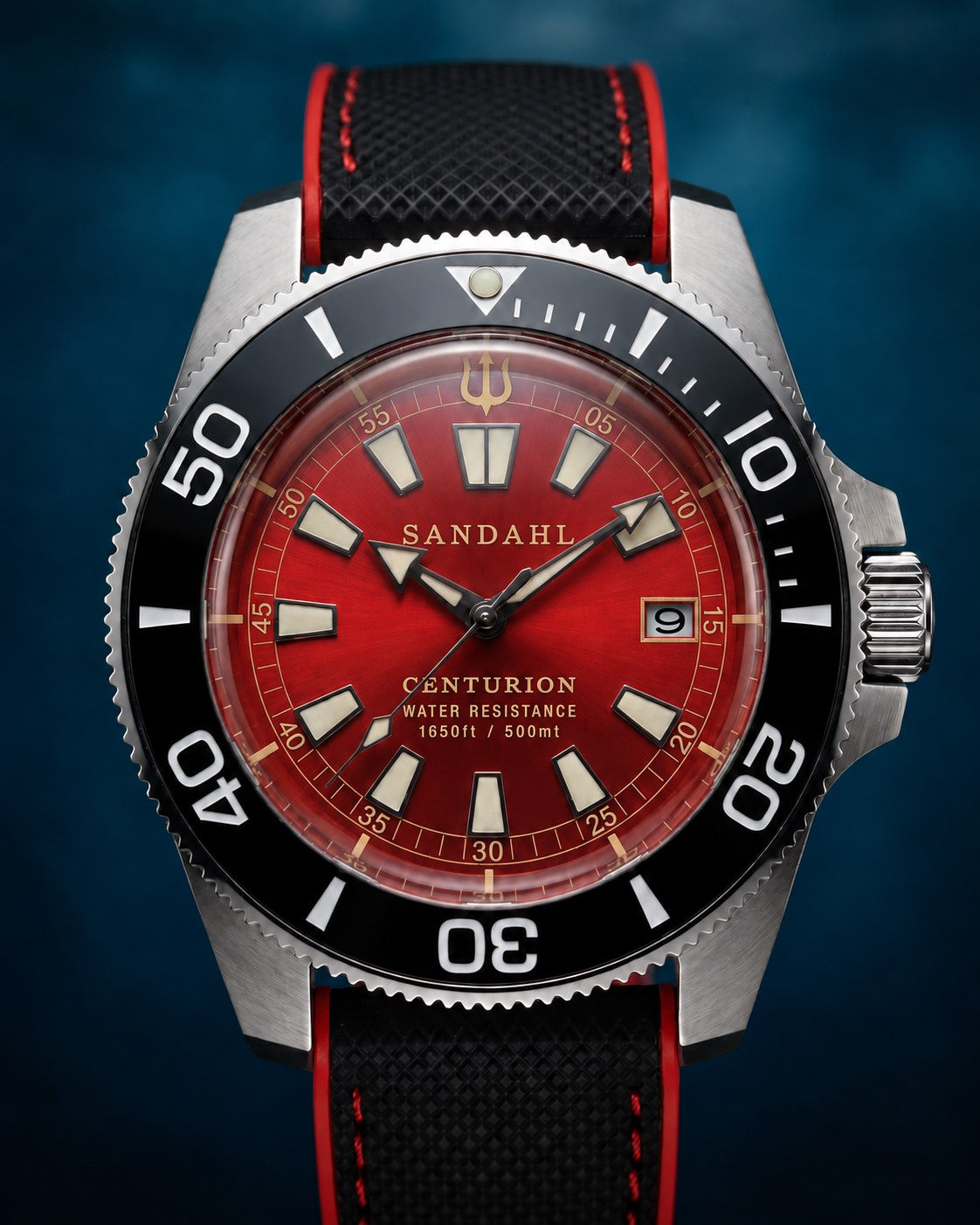 SANDAHL CENTURION Signal Red with a red dial, black dive bezel and black strap with red accents, viewed from the front.