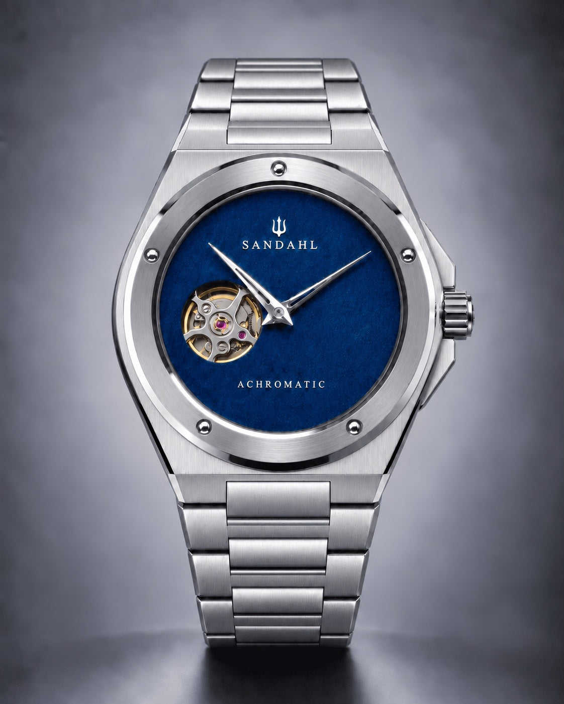 SANDAHL ACHROMATIC Cobalt with a blue open-heart dial and stainless steel bracelet, viewed from the front.
