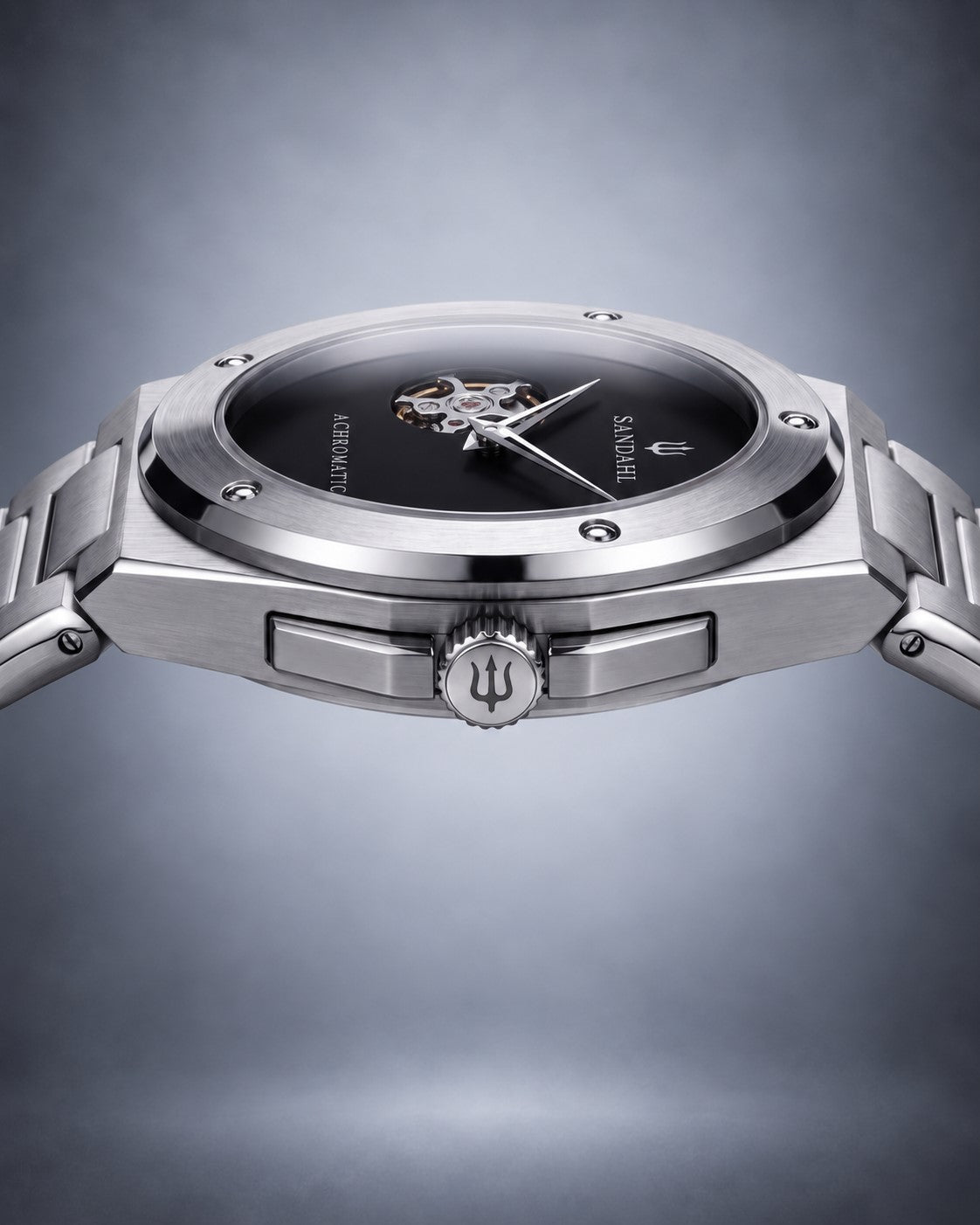 Angled view of the SANDAHL ACHROMATIC Musou, showing its black dial, steel case, crown and steel bracelet.