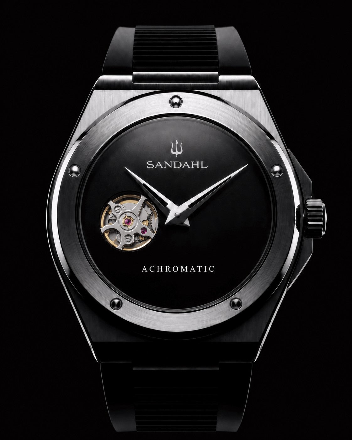 SANDAHL ACHROMATIC Musou with a black open-heart dial and black rubber strap against a dark background.