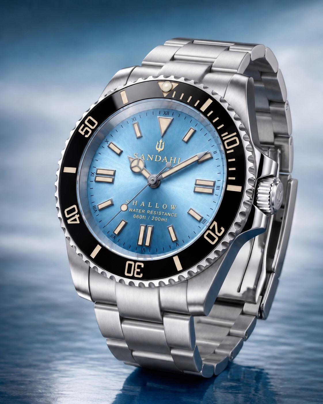 SANDAHL SHALLOW Glacial Blue with a stainless steel bracelet, shown at an angle.
