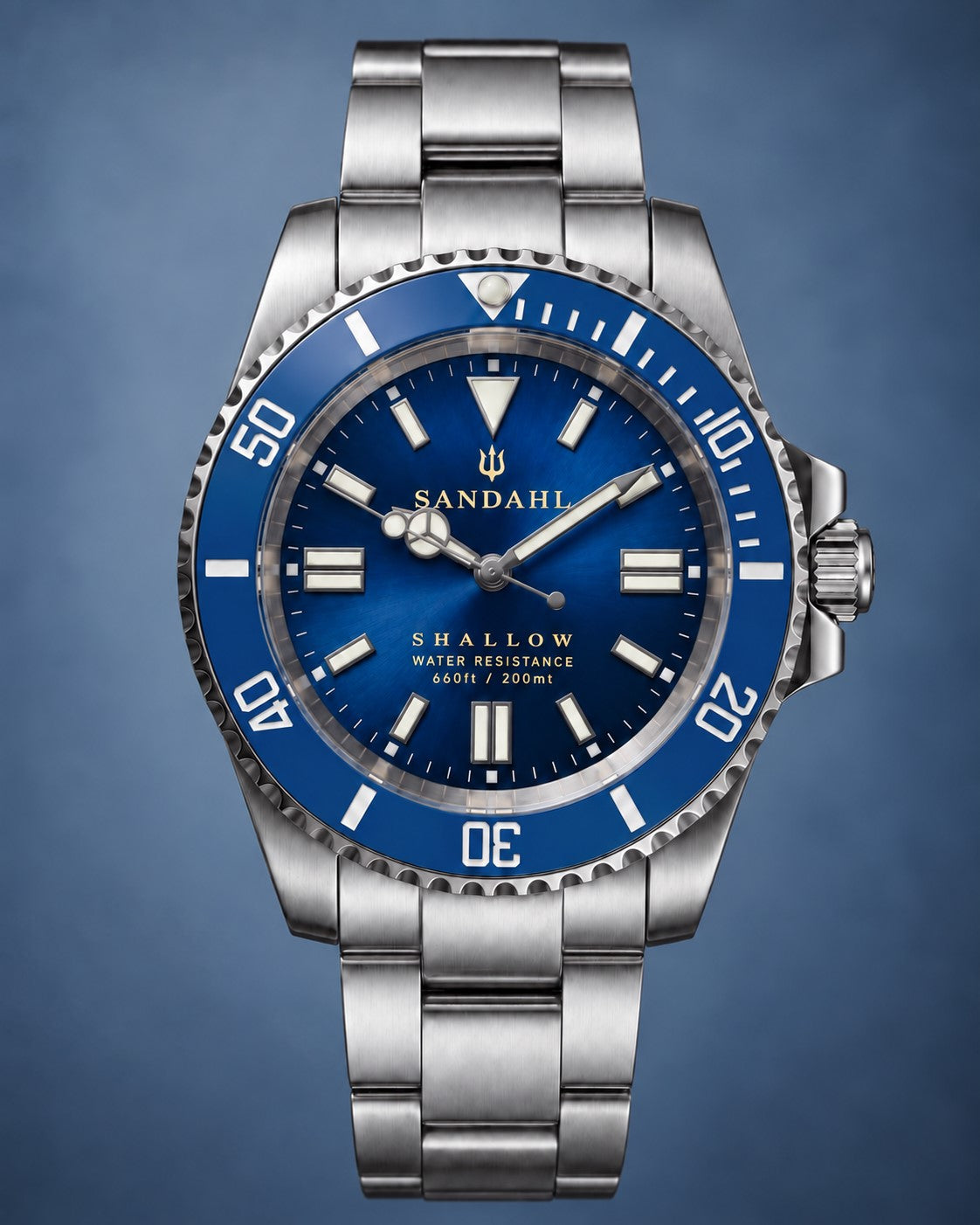 SANDAHL SHALLOW Kattegatt Blue with blue sunburst dial, blue dive bezel and brushed stainless-steel bracelet, photographed straight on.