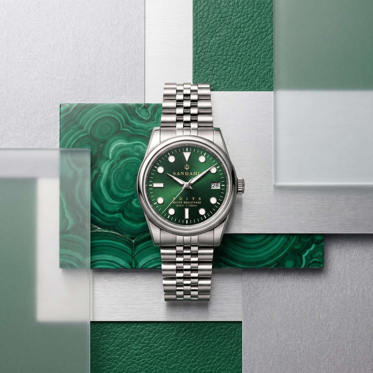 SANDAHL SUITS Regent Green with a Jubilee bracelet, arranged with green leather, malachite-patterned stone, steel and glass.