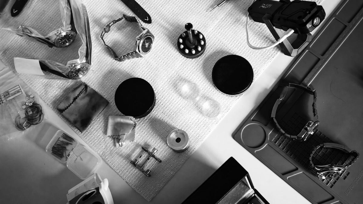 SANDAHL Watches workbench with watches and watchmaking tools